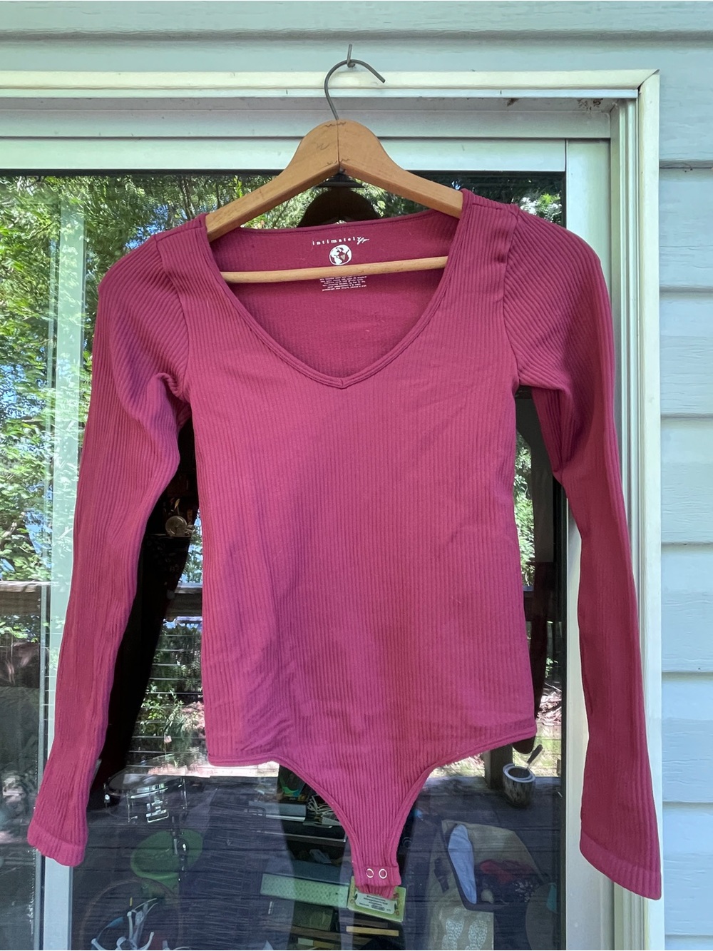 Free People Ribbed V-Neck Long Sleeve Bodysuit in Rose - Women